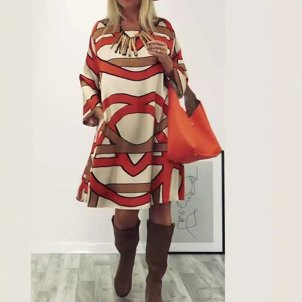 Women's generous swing dress with wide tulip hem, batwing sleeves and graphic all-over pattern Mune Fashion