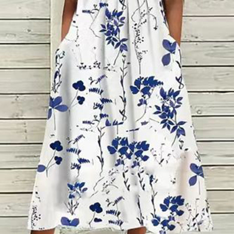 Ladies' airy A-line midi dress with lace sleeves, side pockets, and round neckline Mune Fashion