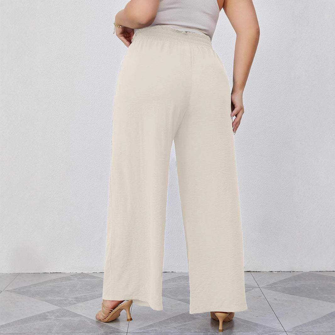Women's paperbag pants with wide leg, elastic waistband, tie belt, and side pockets Mune Fashion
