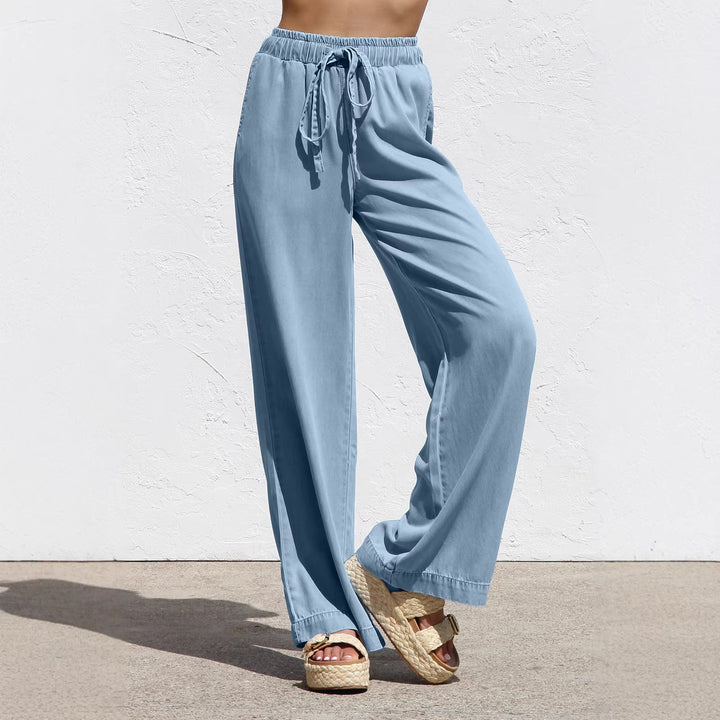 Ladies' wide linen-look summer trousers with elastic waistband, drawstring, and side pockets Mune Fashion