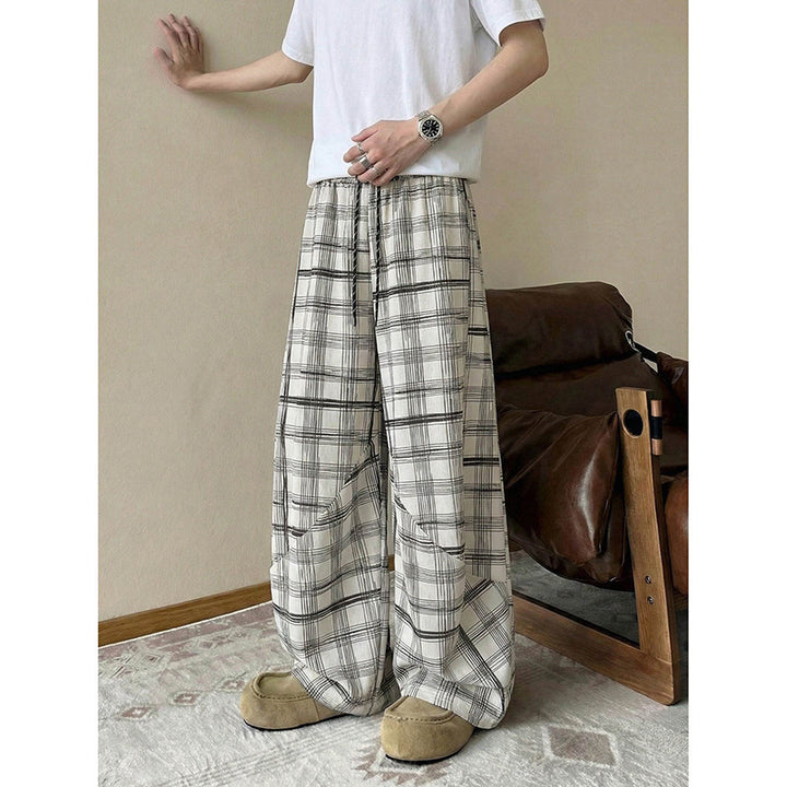 Men's wide checkered lounge pants with elastic waistband and drawstring
