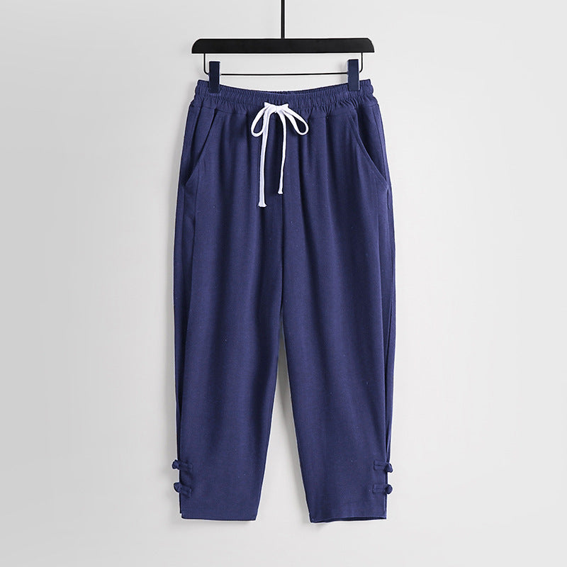 Women's casual jogging pants with drawstring and decorative buttons at the ankle Mune Fashion