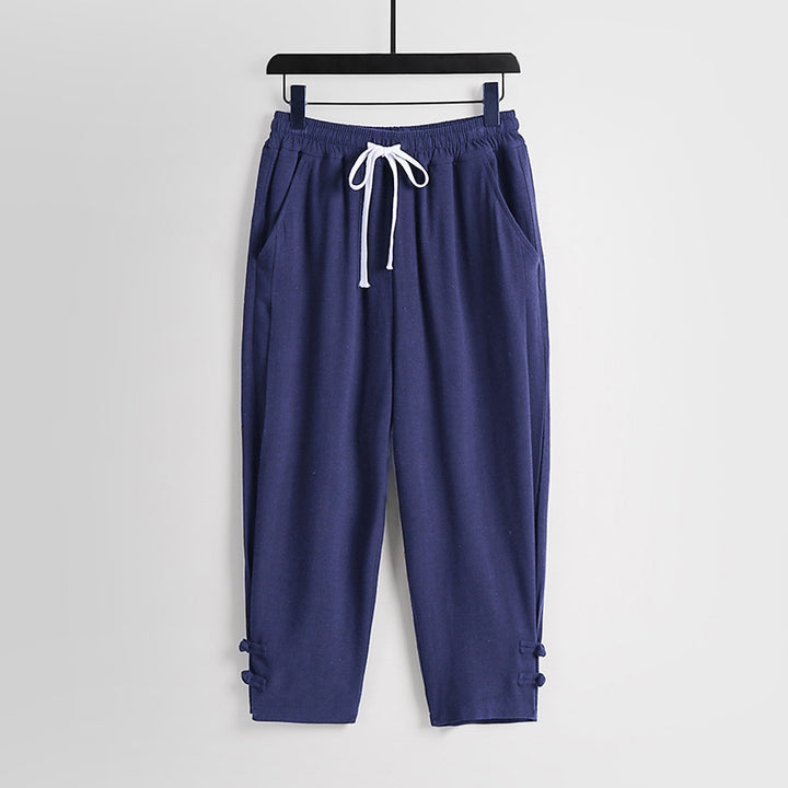 Women's casual jogging pants with drawstring and decorative buttons at the ankle Mune Fashion