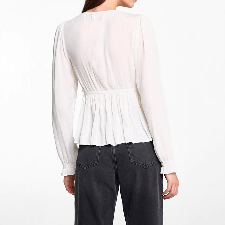 Women's peplum blouse made of textured viscose fabric with V-neckline and button placket Mune Fashion