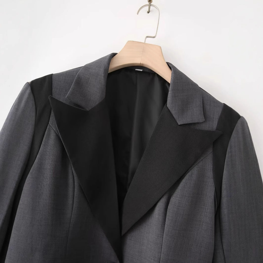 Women's oversized blazer with contrasting lapel, single-button placket, and flap pockets Mune Fashion
