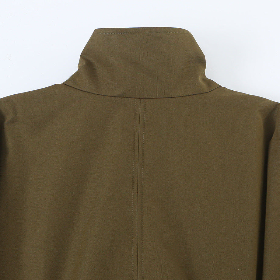 Women's short jacket with drawstring waist, high stand-up collar, and asymmetric button placket Mune Fashion
