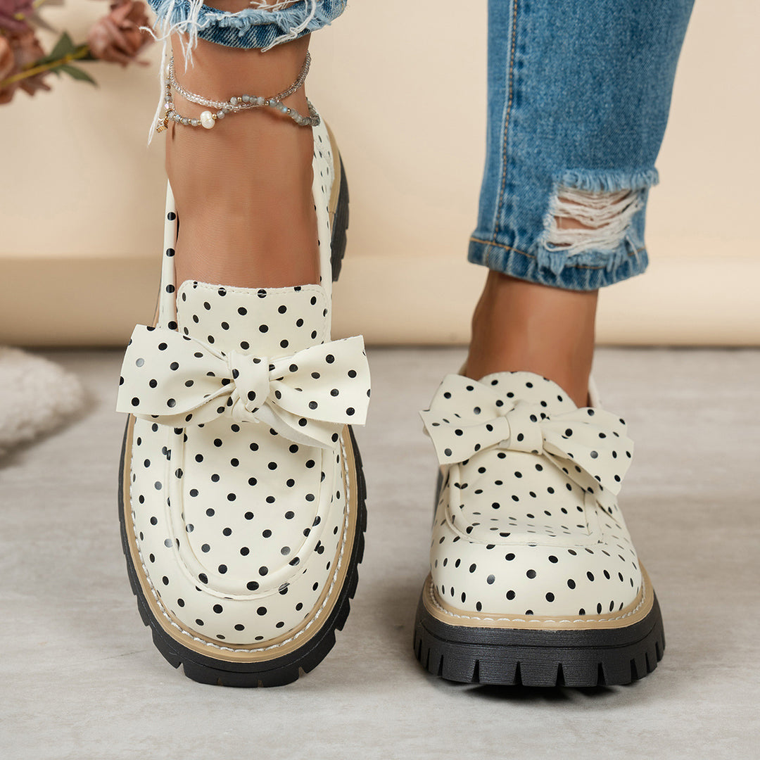 Women's casual loafers with polka dot pattern and decorative bow on a profiled platform sole Mune Fashion