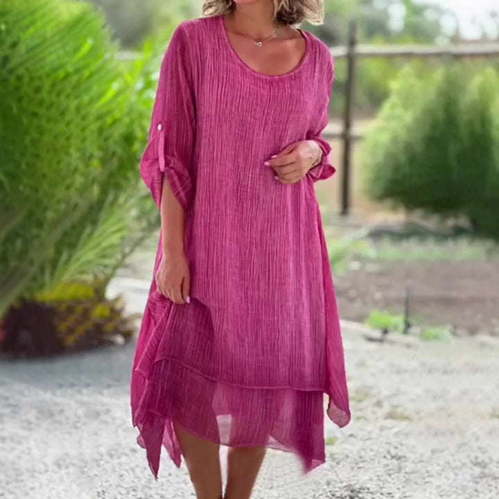 Ladies wide muslin midi dress with round neckline, roll-up half-length sleeves, and layered tiered skirt Mune Fashion