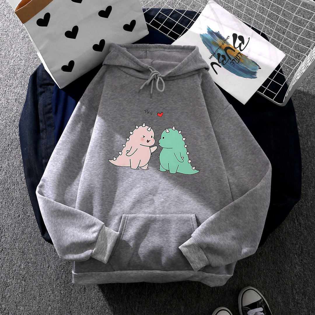 Women's hoodie with cute dinosaur couple illustration, oversized cut and kangaroo pocket Mune Fashion