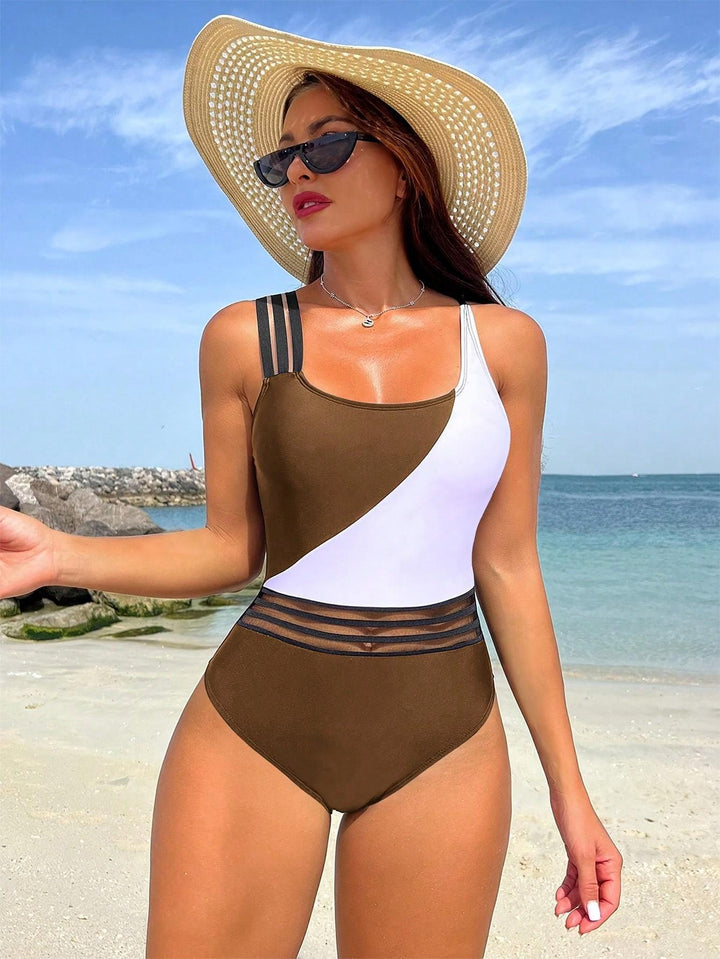 Ladies sporty one-piece swimsuit with innovative cut Mune Fashion