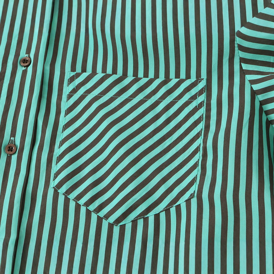 Women's oversized shirt blouse with diagonal stripe pattern, breast pocket, and asymmetrical hem.