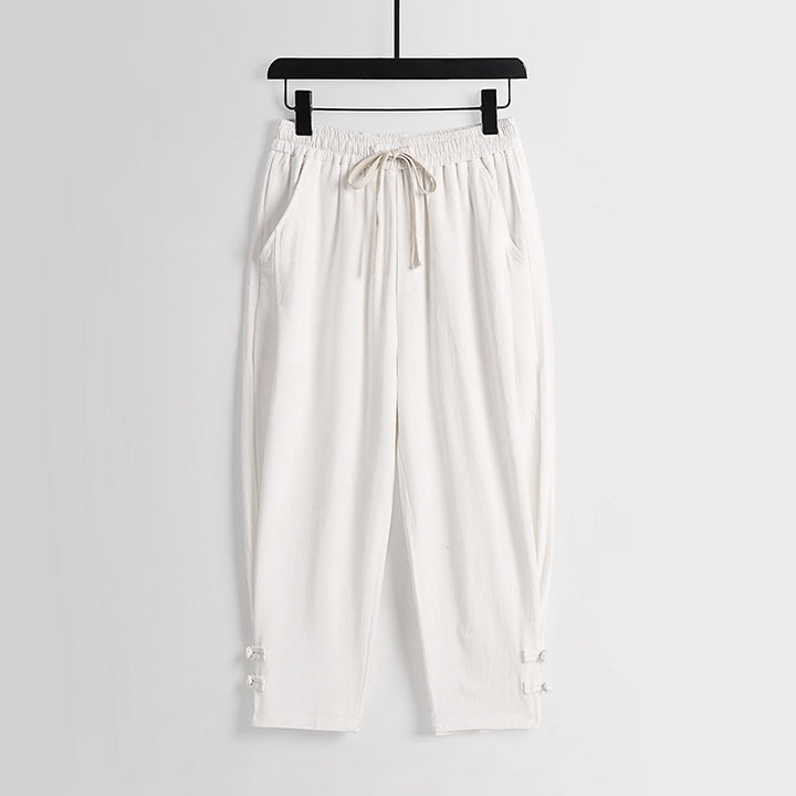 Women's casual jogging pants with drawstring and decorative buttons at the ankle Mune Fashion