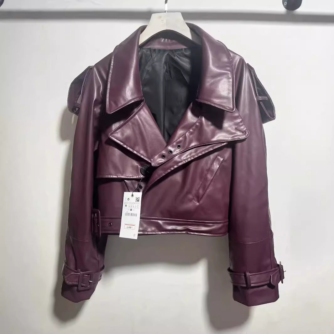 Women's cropped faux leather trench blouson with shawl collar, belt and adjustable cuff straps Mune Fashion