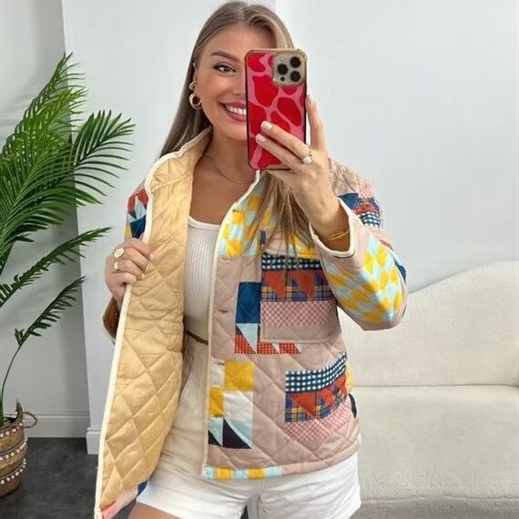 Women's quilted patchwork jacket with stand-up collar and flap pockets Mune Fashion
