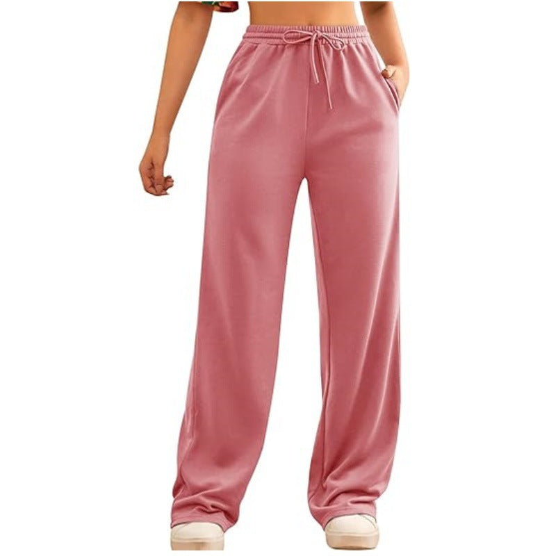 Women's flowing Relax palazzo pants with high comfort waistband, drawstring and side slip pockets Mune Fashion