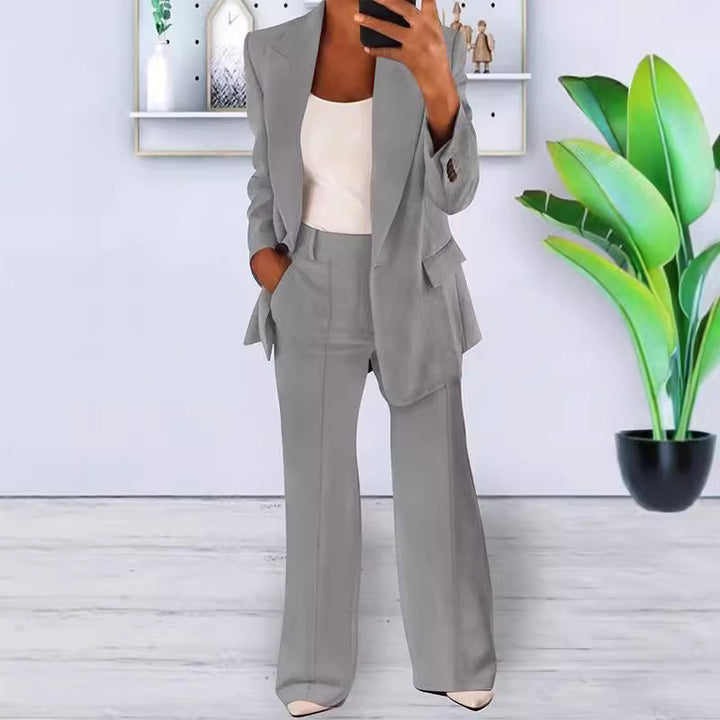 Women’s office-appropriate pantsuit set with wide trousers and tailored blazer Mune Fashion