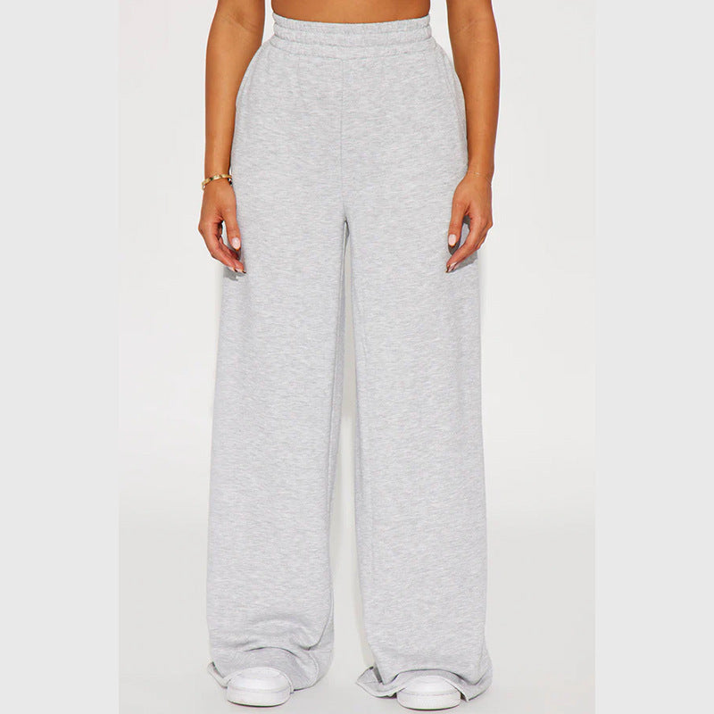 Ladies high-waist palazzo trousers made of French terry with wide legs, elastic comfort waistband and open hem edges Mune Fashion