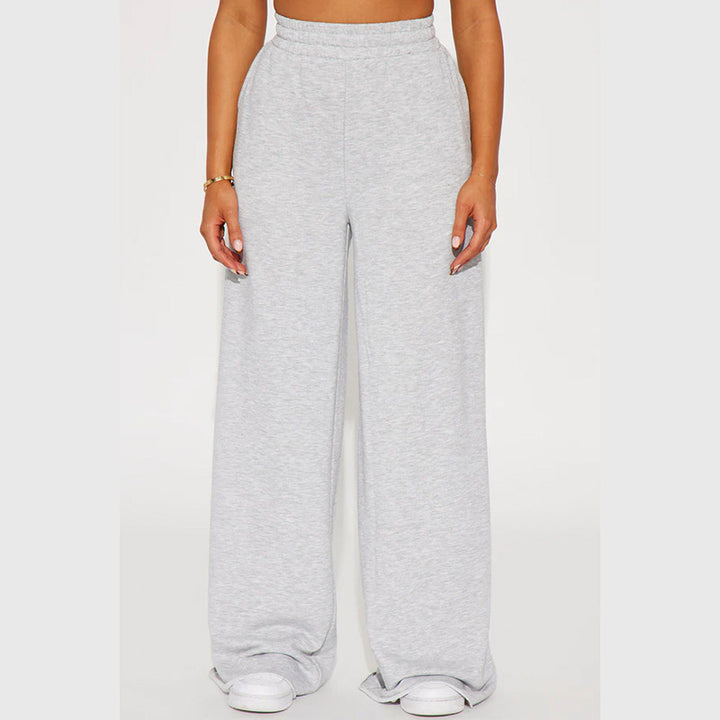 Ladies high-waist palazzo trousers made of French terry with wide legs, elastic comfort waistband and open hem edges Mune Fashion