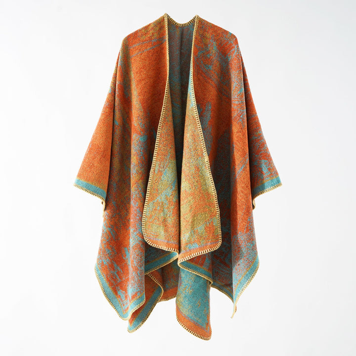 Women Oversize Ruana in boxy cape with jacquard woven structure and soft wool blend drape