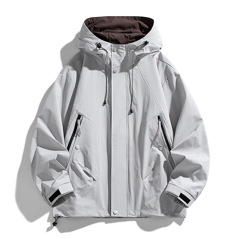 Unisex lightweight windproof outdoor jacket with hood, water-repellent outer shell and adjustable hem Mune Fashion