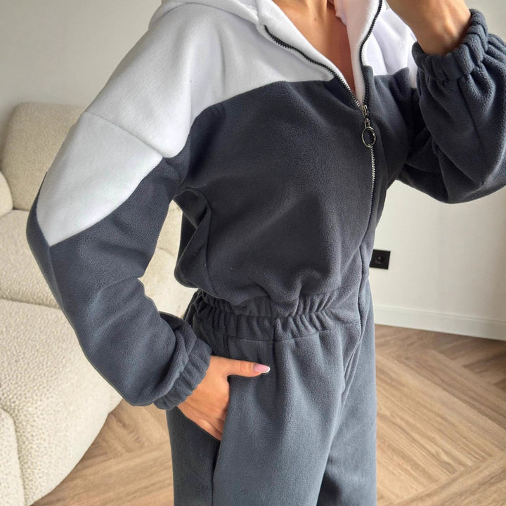 Ladies cozy fleece jumpsuit with hood, full-length zipper and elastic cuffs Mune Fashion