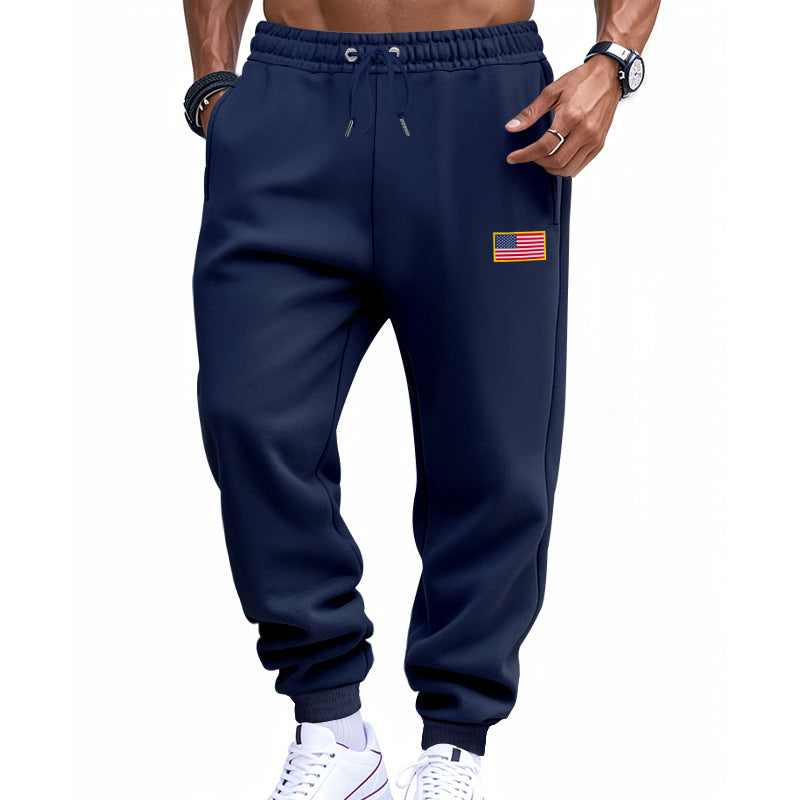 Men's slim-fit sweatpants with tapered leg, elastic drawstring waistband, and discreet flag application Mune Fashion