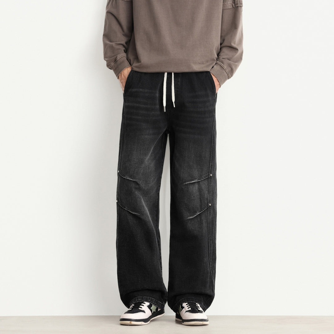 Men's Loose Fit Denim Pants with Drawstring Waistband, Panel Seams and Used Wash Mune Fashion