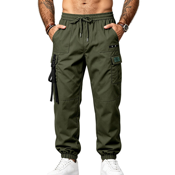Men's utility cargo pants in jogger style with elastic waistband, multiple pockets and leg straps Mune Fashion