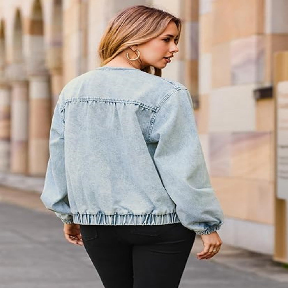 Women's bomber-style denim jacket with round neck, piping seams, and elastic hem Mune Fashion