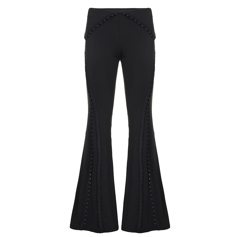 Women’s flared trousers with high V waistband, figure-contouring seams and decorative rings Mune Fashion