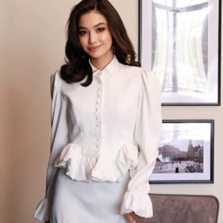 Ladies tailored peplum blouse with stand-up collar, covered button placket and puff sleeves Mune Fashion