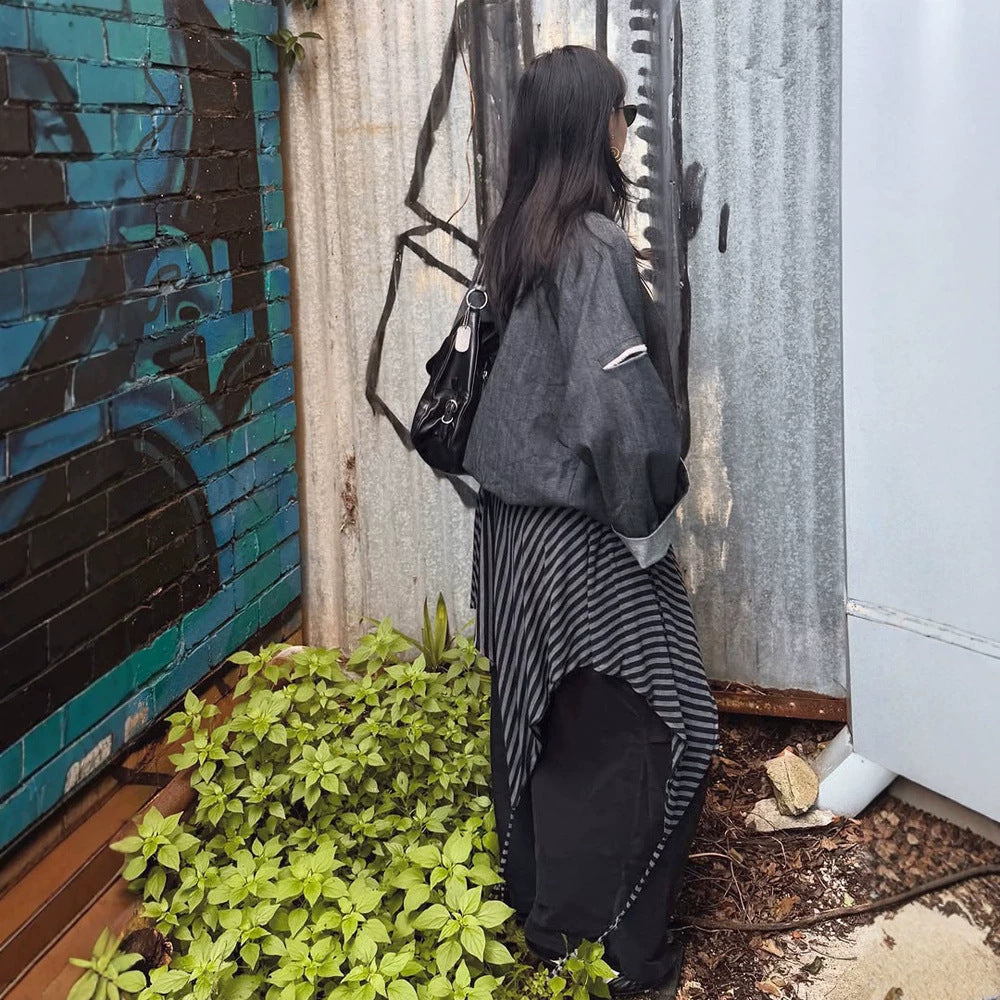 Women’s oversized boxy jacket with asymmetric button closure and arm pocket Mune Fashion
