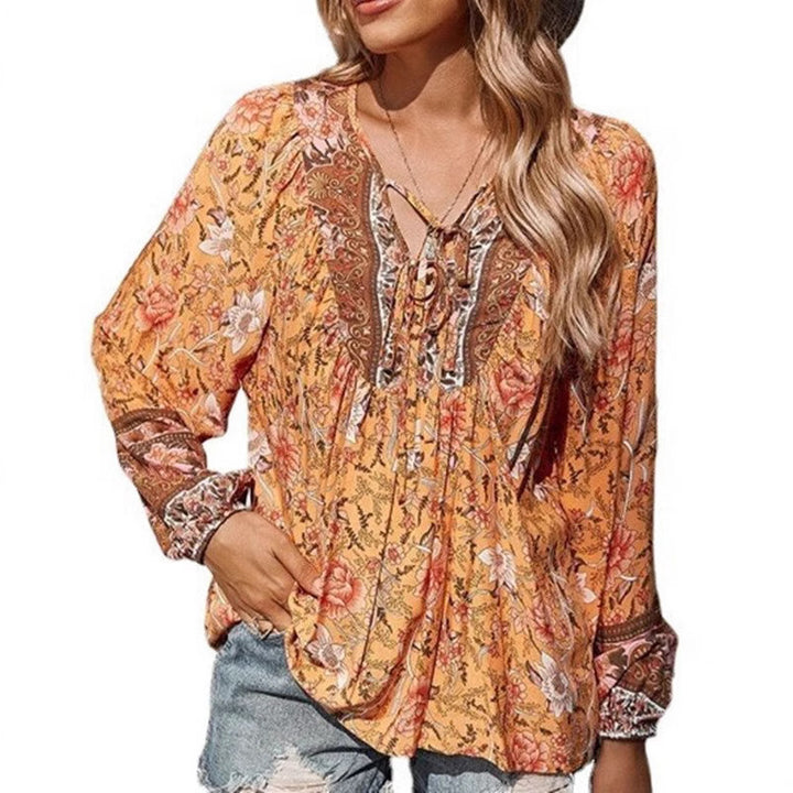 Ladies Boho blouse with floral print, V-neck with tie and pleat details Mune Fashion