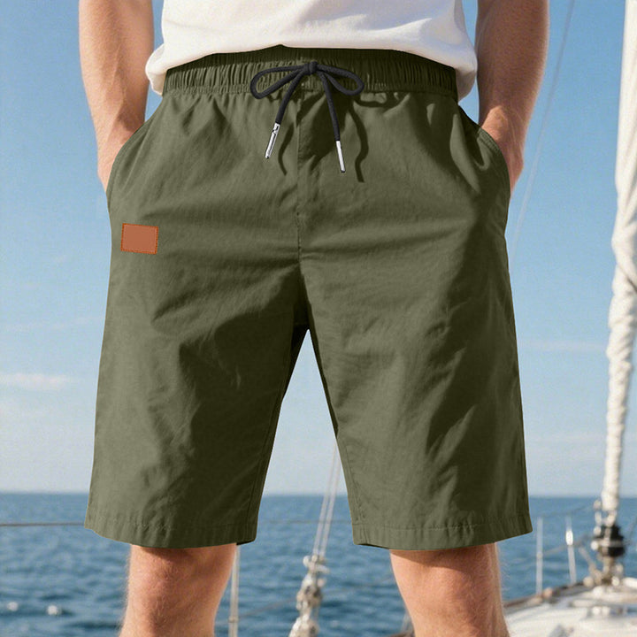 Men's quick-drying swim shorts in Bermuda cut with elastic waistband and drawstring Mune Fashion