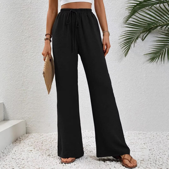 Ladies lightweight, loose-fitting beach pants with elastic waistband, drawstring and side pockets Mune Fashion