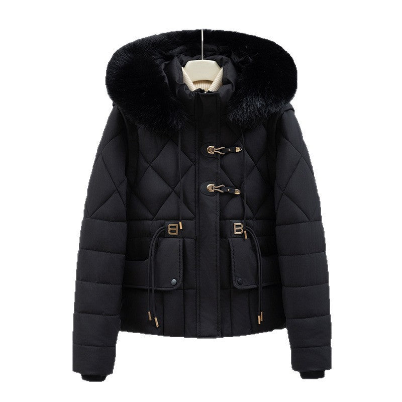 Women's short quilted hooded jacket with voluminous faux fur trim, drawstring waist, and flap pockets Mune Fashion