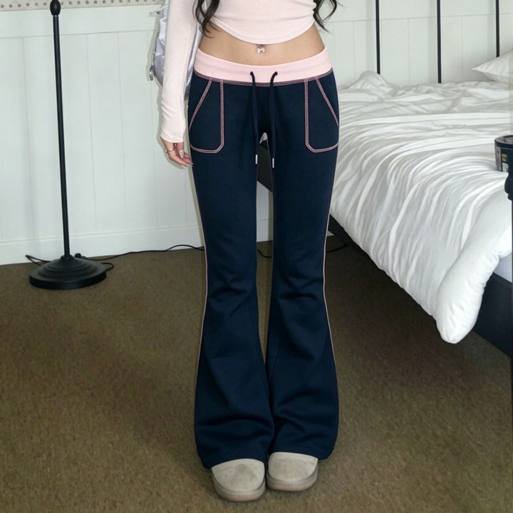 Women nan flared sweatpants with high waistband, drawstring, and contrasting decorative seams Mune Fashion