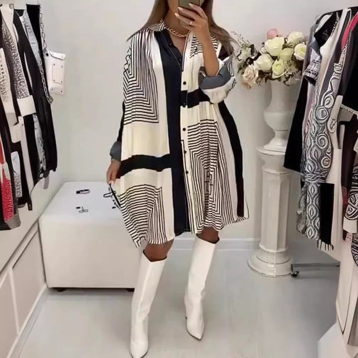 Women's knee-length A-line shirt dress with graphic line print, concealed button placket, and oversized cuffs Mune Fashion