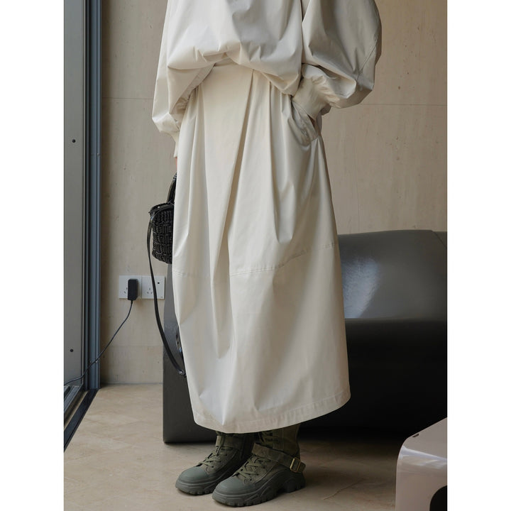 Women Longer Oversize Raincoat with concealed snap button placket and side pockets Mune Fashion
