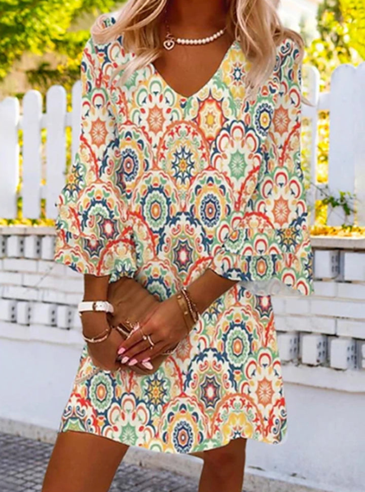 Women's fall A-line mini dress with V-neck, three-quarter bell sleeves, and ornamental mandala print Mune Fashion