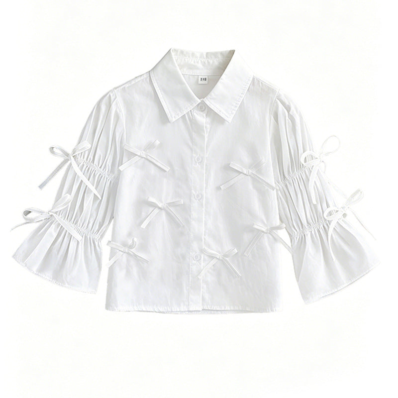 Girl's blouse with ruffle details and bow Mune Fashion