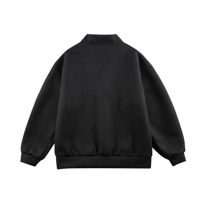 Unisex Boxy knit cardigan in waffle knit with V-neck, continuous button placket, and applied round pockets Mune Fashion