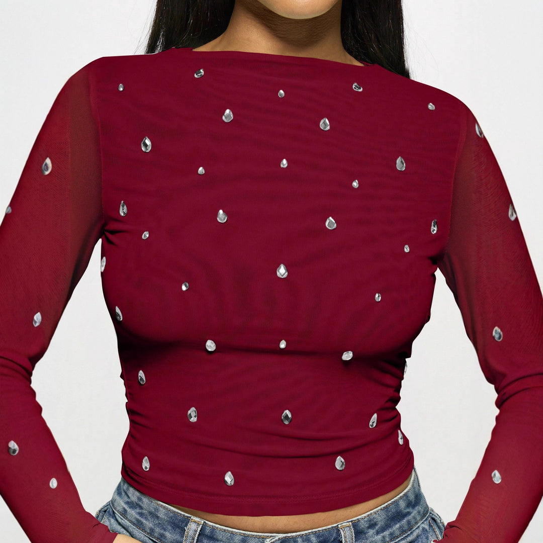 Women's fitted mesh top with rhinestone applications and boat neck Mune Fashion