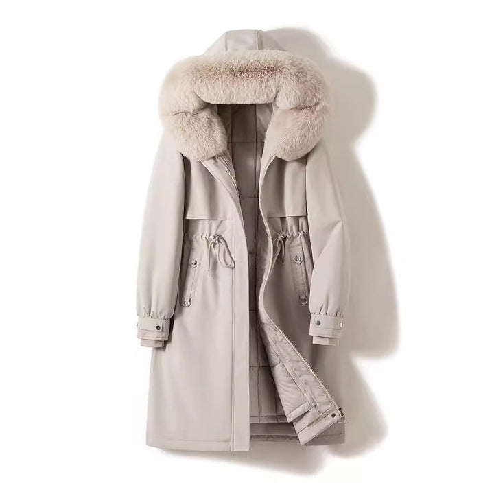 Women's longer water-repellent parka with voluminous faux fur hood, adjustable drawstring waist, and quilted thermal inner jacket Mune Fashion
