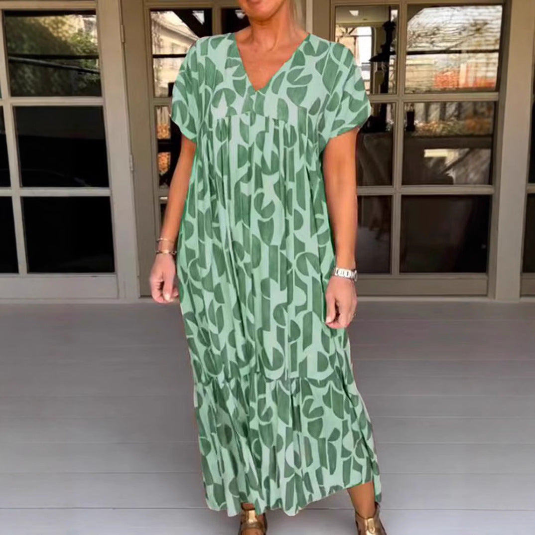 Women's voluminous maxi dress with under-bust seam, V-neck, short kimono sleeves, and tiered ruffle Mune Fashion
