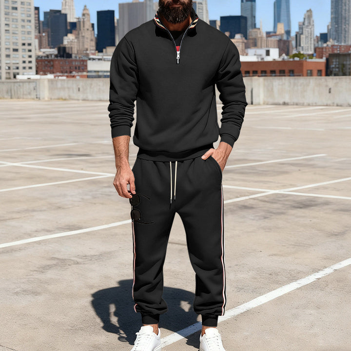 Men's stylish tracksuit set with half-zip, striped side stripes, and tapered jogger pants Mune Fashion