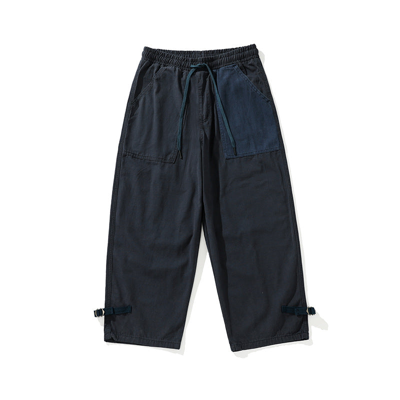 Men's wide cropped cargo pants with elastic drawstring waistband, patch pockets and adjustable ankle straps Mune Fashion
