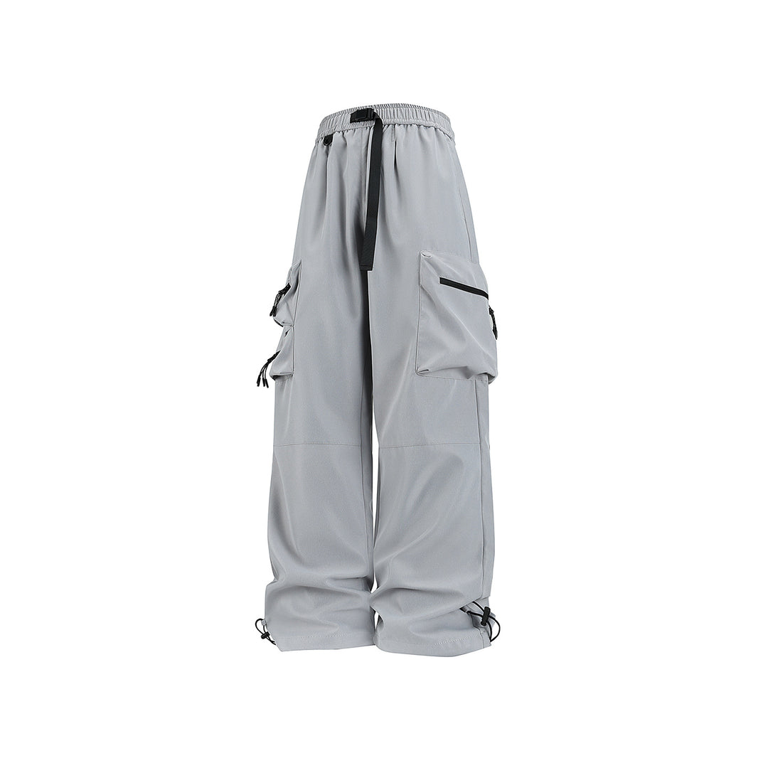 Men's loose technical cargo pants with multi-functional pockets, drawstring waistband, and adjustable leg closures Drune