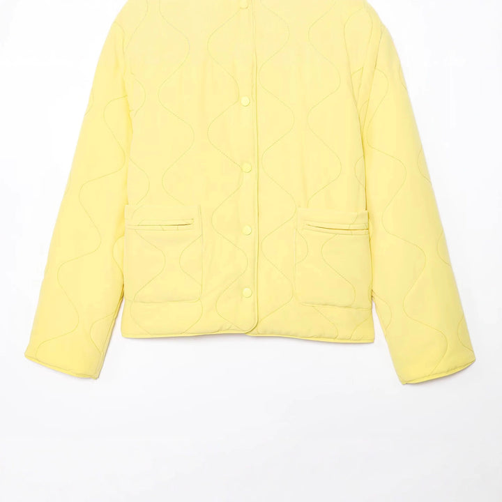 Women's quilted transitional jacket with wave stitching, V-neck and snap button placket Mune Fashion