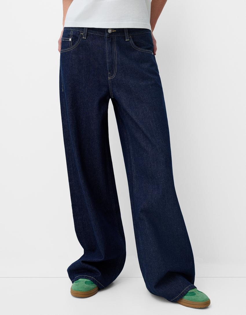 Women's ultra-wide floor-length denim palazzo pants with clean pocket cut and light stretch effect Mune Fashion